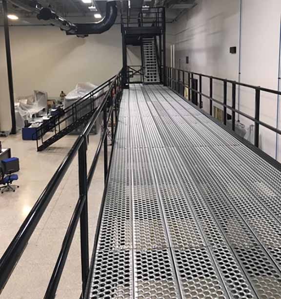 Black and silver walkway, catwalk or work platform, as a part of material handling equipment